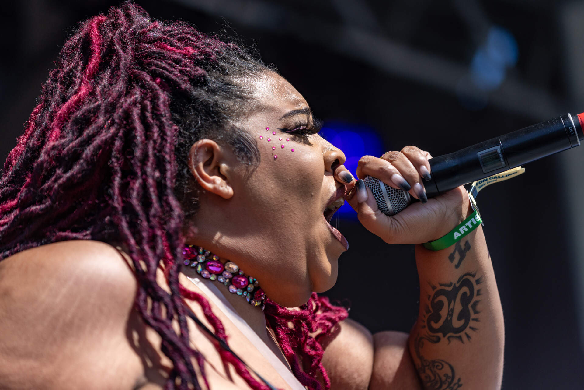 Brandie Blaze performs on the local stage at Boston Calling. (Jesse Costa/WBUR)