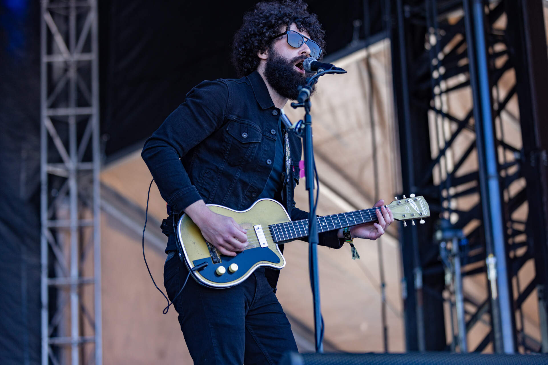 Guitarist Pat Faherty of GA-20 performs on the Blue Stage at Boston Calling. (Jesse Costa/WBUR)