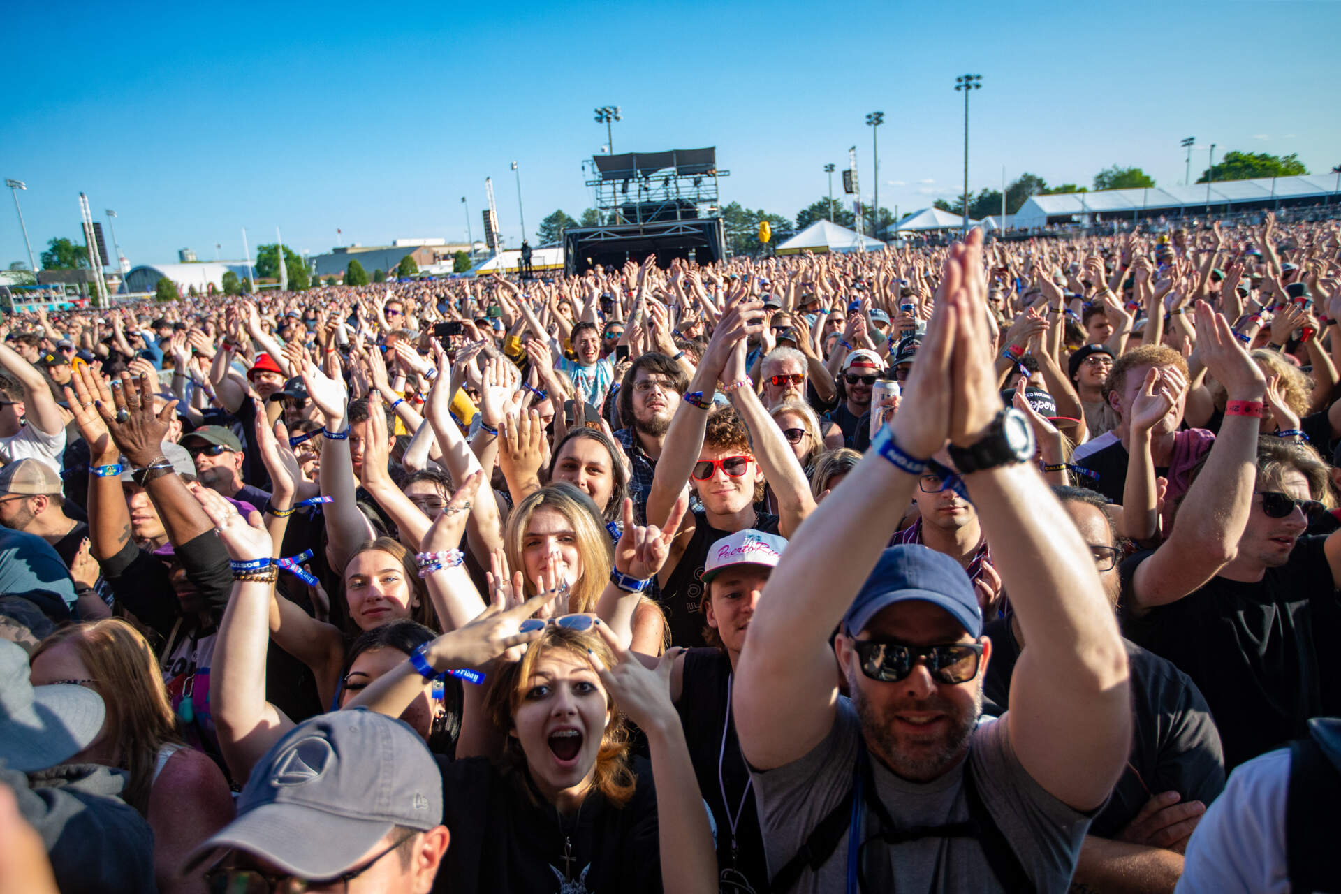 The audience claps along while the Dropkick Murphys play their set at Boston Calling. (Jesse Costa/WBUR)