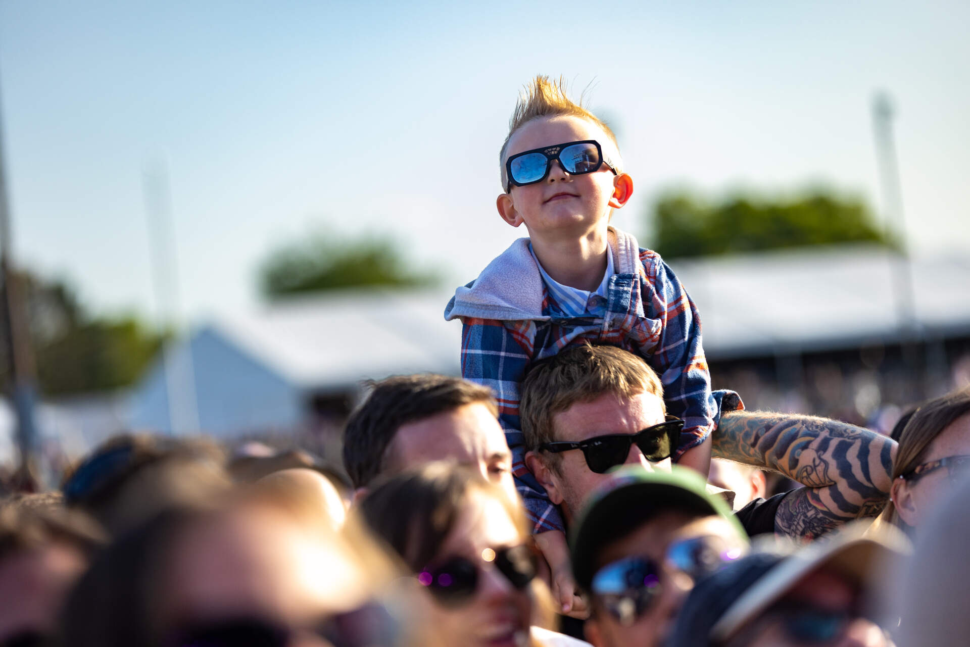 A young fan in the audience while the Dropkick Murphys play their set at Boston Calling. (Jesse Costa/WBUR)