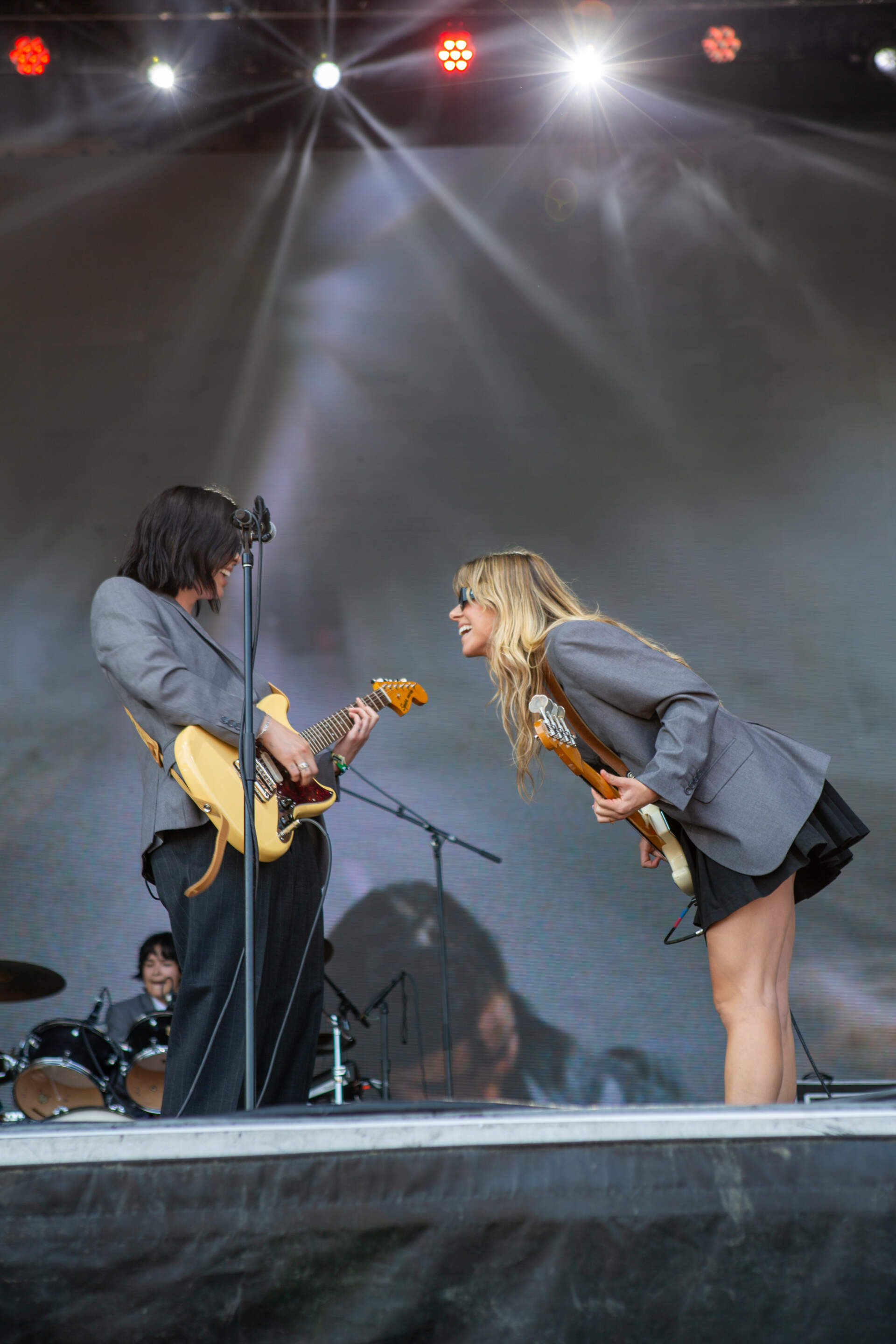 The Aces' Cristal Ramirez (left) and McKenna Petty (right) groove together at Day 2 of Boston Calling (Jacob Garcia/WBUR)