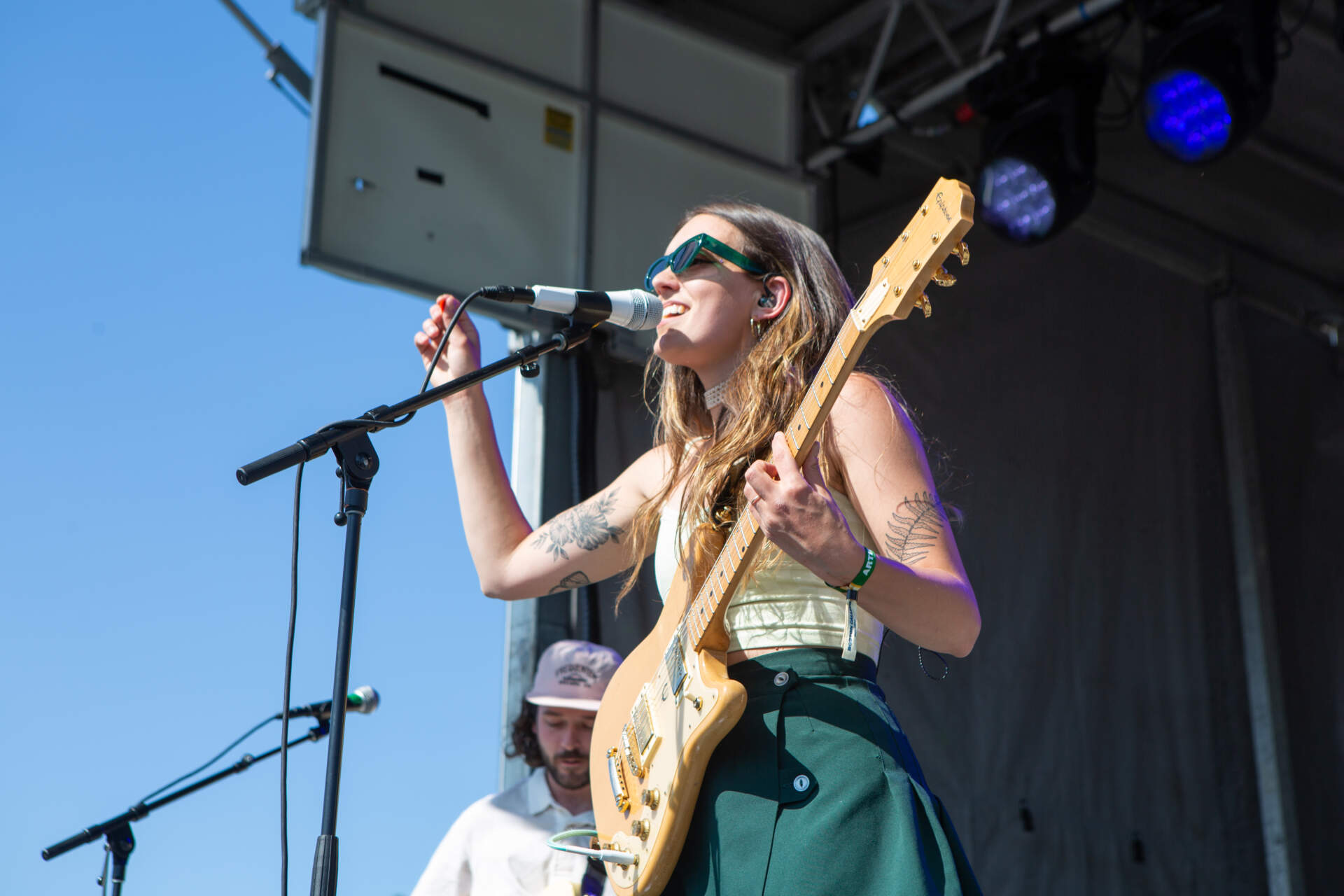 Singer-songwriter Carly Kraft performs with her band Coral Moons on the Orange Stage for Day 2 of Boston Calling (Jacob Garcia/WBUR)