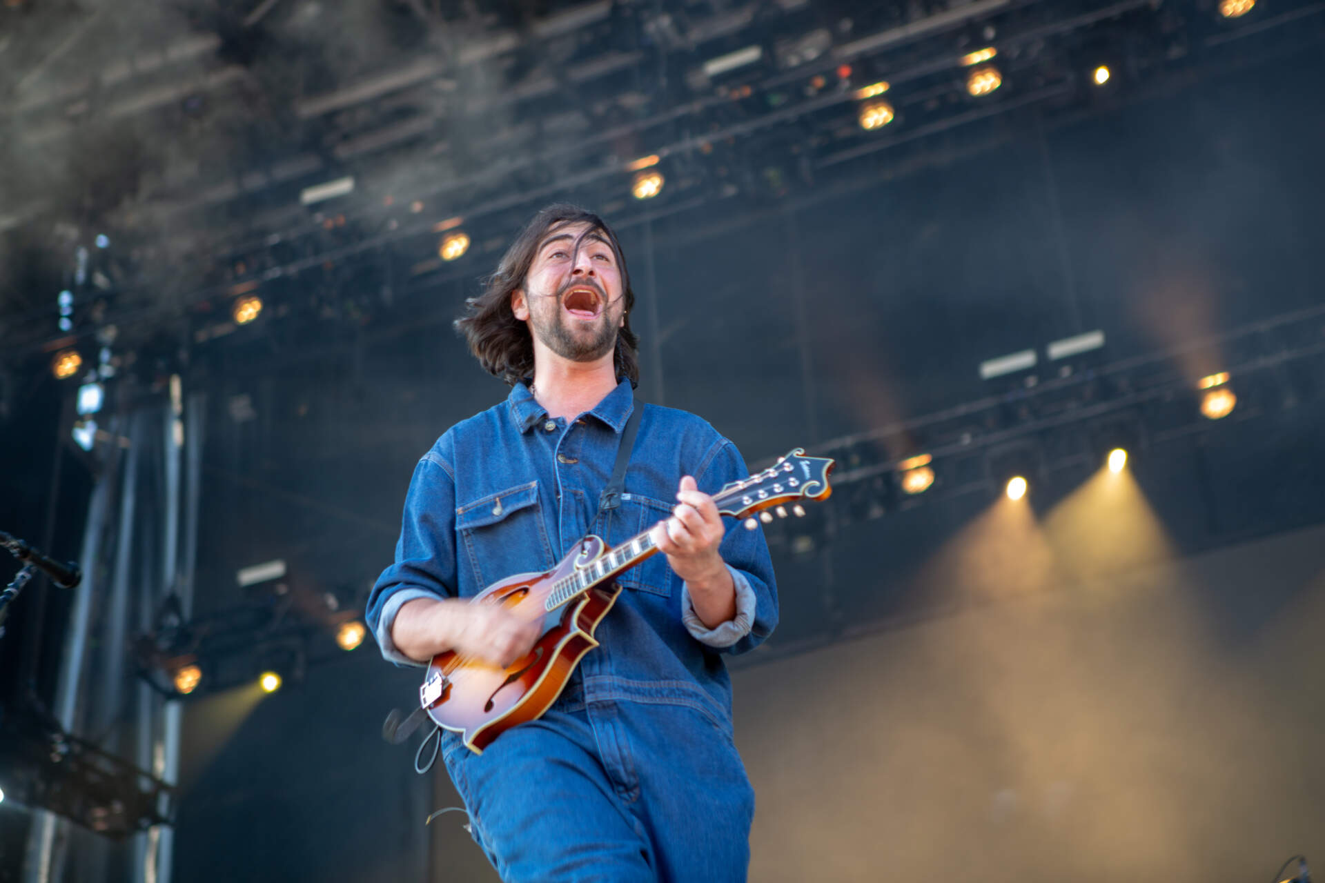 New England singer-songwriter Noah Kahan sings to the green stage crowd on Day 2 of Boston Calling. (Jacob Garcia/WBUR)