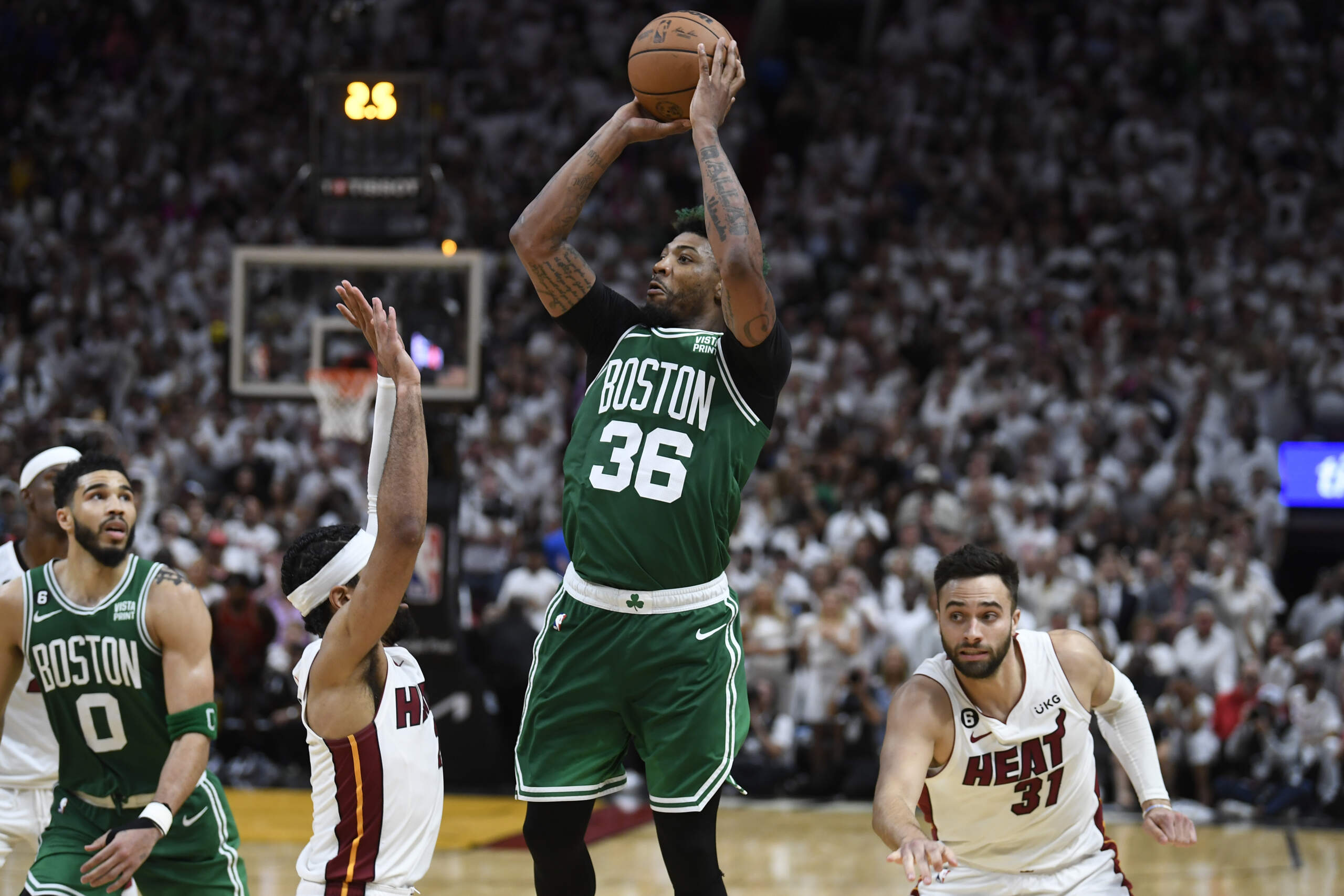 Boston Celtics guard Marcus Smart (36) takes a shot during final seconds of the second half of Game 6 of the NBA basketball Eastern Conference finals against the Miami Heat. (Michael Laughlin/AP)