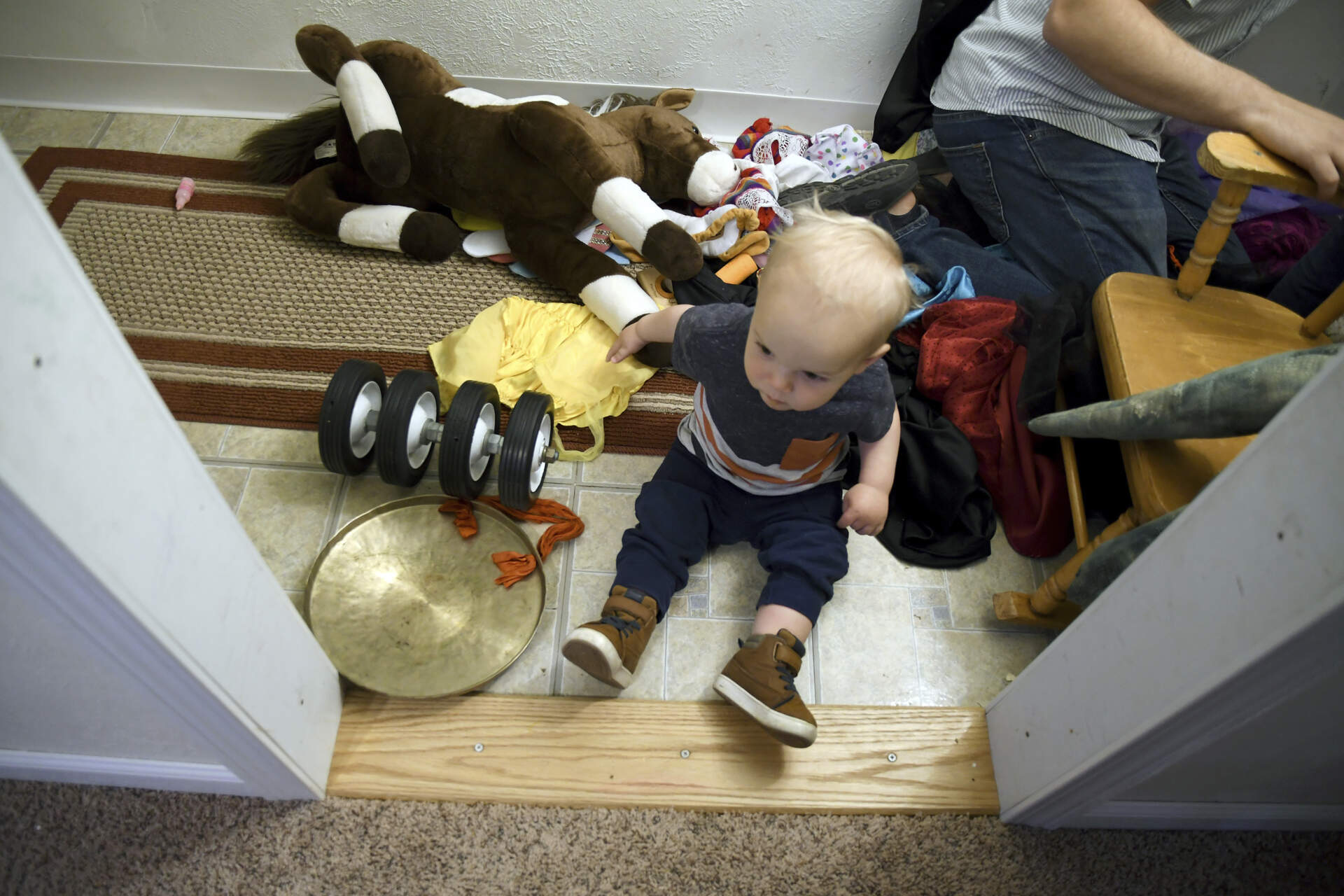 Cal Sabey, 1, plays at a relative's home in Centennial, Colo., Wednesday, May 3, 2023. (Thomas Peipert/AP)