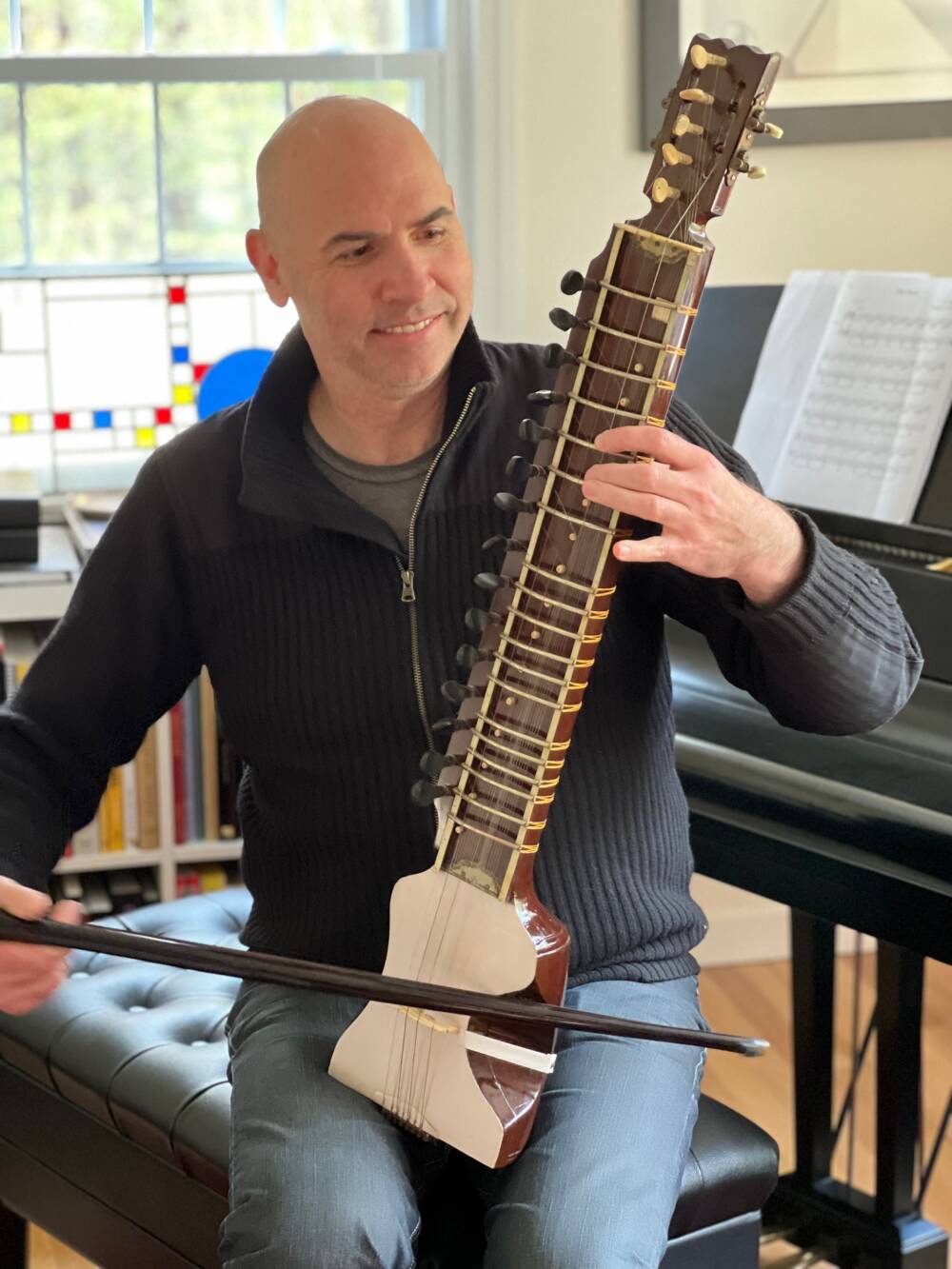 Eric Shimelonis plays the dilruba: a relatively young instrument by Indian terms, since experts believe it’s only about 200 years old! (courtesy of Rebecca Sheir)