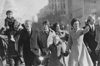 Jimmy, Amy and Rosalynn Carter walk in the inaugural parade in Washington, D.C. on January 20, 1977. (Dick Yarwood/Newsday RM via Getty Images)