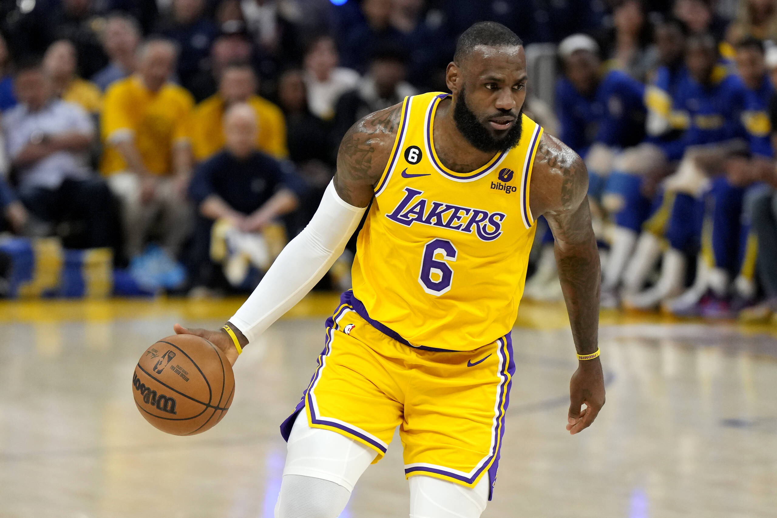 LeBron James #6 of the Los Angeles Lakers brings the ball up court during the first quarter against the Golden State Warriors in game five of the Western Conference Semifinal Playoffs at Chase Center on May 10, 2023 in San Francisco, California. (Thearon W. Henderson/Getty Images)