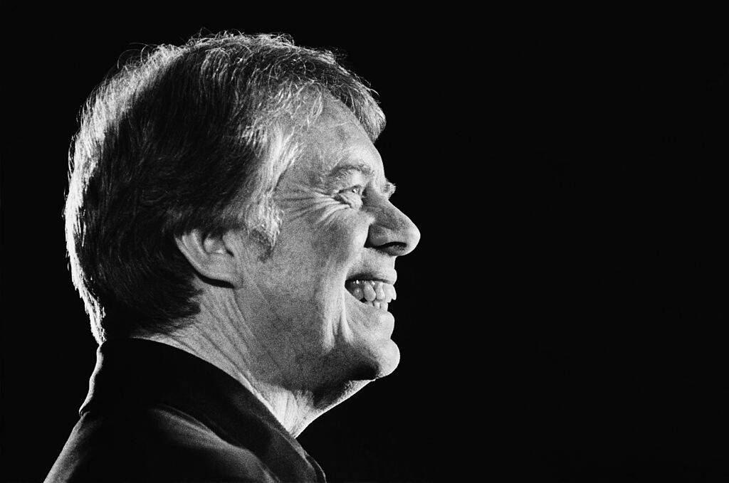 Presidential candidate and former Governor of Georgia, Jimmy Carter, grins during a 1976 Los Angeles, California, campaign speech. (Photo by George Rose/Getty Images)