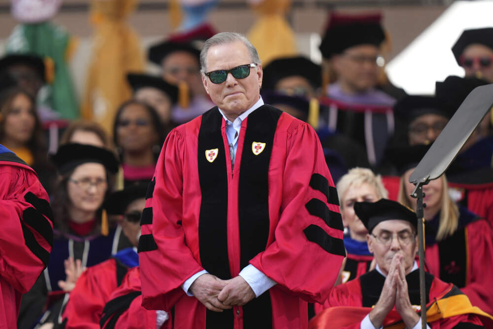 Warner Bros. Discovery CEO David Zaslav stands onstage before delivering a commencement address at Boston University on May 21, 2023. (Steven Senne/AP)