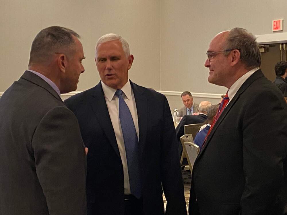 Former Vice President Mike Pence talking with fellow Republicans in Concord, New Hampshire (Anthony Brooks/WBUR)