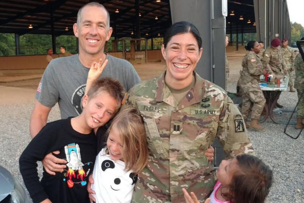 Scot Shumski with his wife, Capt. Promotable Julia Flores, and their three children. (Courtesy of Scot Shumski)