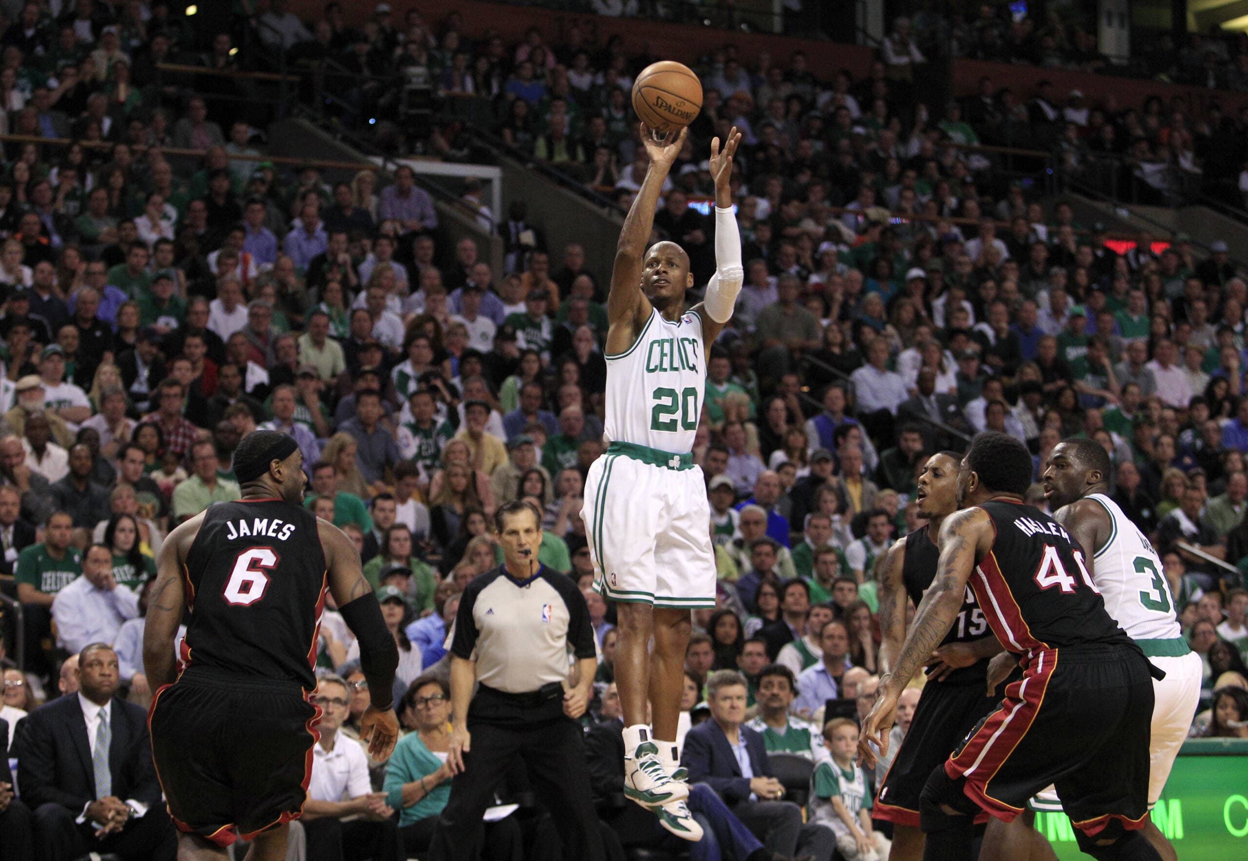 Former Boston Celtics guard Ray Allen attempts a 3-point shot against the Miami Heat during the first quarter of Game 4 of the NBA basketball Eastern Conference finals in Boston on June 3, 2012. (Elise Amendola/AP)