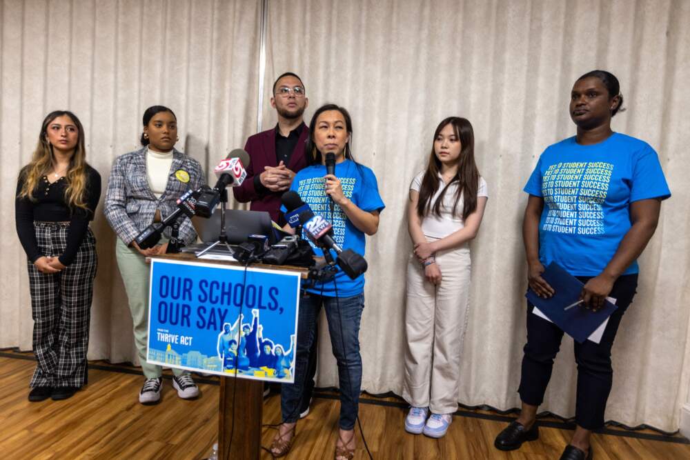 Vatsady Sivongxay, a public school parent and executive director of the Massachusetts Education Justice Alliance, speaks at the Thrive Act press conference at the Church on the Hill. (Jesse Costa/WBUR)