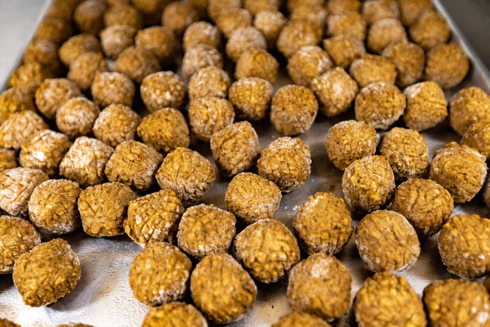 Meatballs made with textured soy protein for zucchini pasta and meatballs with roasted tomato and shallot coulis. (Jesse Costa/WBUR)