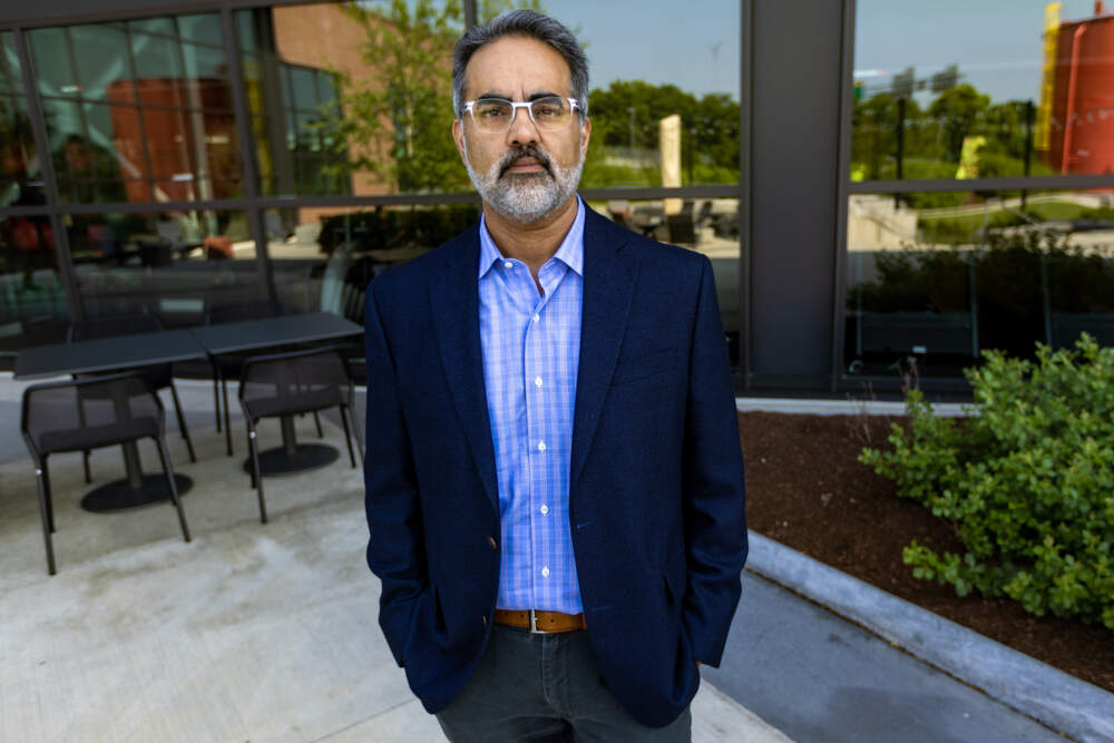 Rahul Dhanda, who has a son in 7th grade at the O’Bryant School, opposes the proposal to move the school. (Jesse Costa/WBUR)