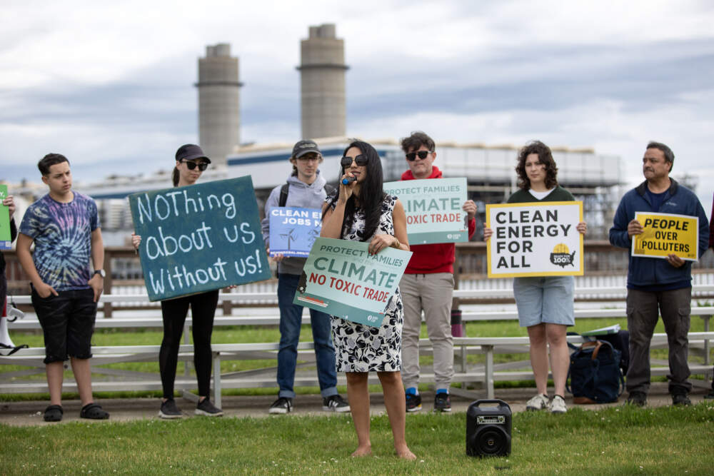 Everett Councilor Stephanie Martins speaks with residents and local climate activists near the Everett marine Terminal. (Robin Lubbock/WBUR)