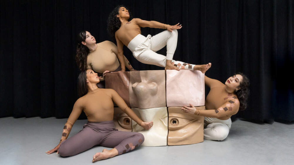 Dancers with Michael Alfano's sculpture &quot;Cubed.&quot; (Courtesy Melissa Blackall)
