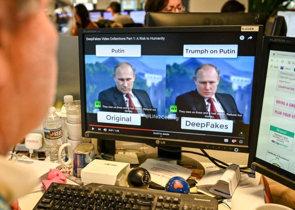 A AFP journalist views a video on January 25, 2019, manipulated with artificial intelligence to potentially deceive viewers, or "deepfake" at his newsdesk in Washington, DC. - "Deepfake" videos that manipulate reality are becoming more sophisticated and realistic as a result of advances in artificial intelligence, creating a potential for new kinds of misinformation with devastating consequences. - TO GO WITH AFP STORY by Rob LEVER "Misinformation woes may multiply with deepfake videos" (Photo by Alexandra ROBINSON / AFP) / TO GO WITH AFP STORY by Rob LEVER "Misinformation woes may multiply with deepfake videos" (Photo by ALEXANDRA ROBINSON/AFP via Getty Images)