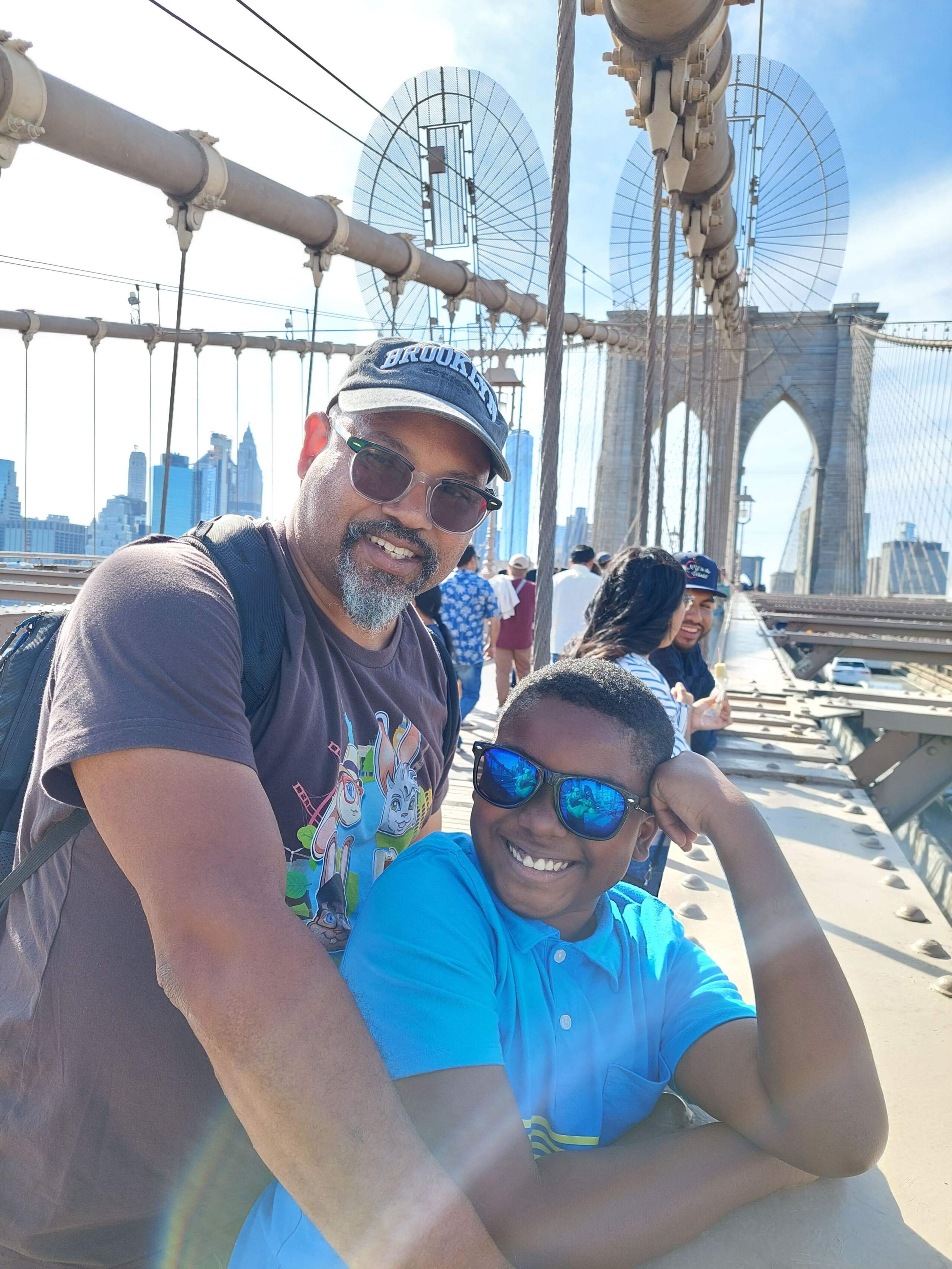 "BunnAmigos" hosts Maurice and Ezra Poplar at the Brooklyn Bridge. (Courtesy of Maurice and Ezra Poplar)