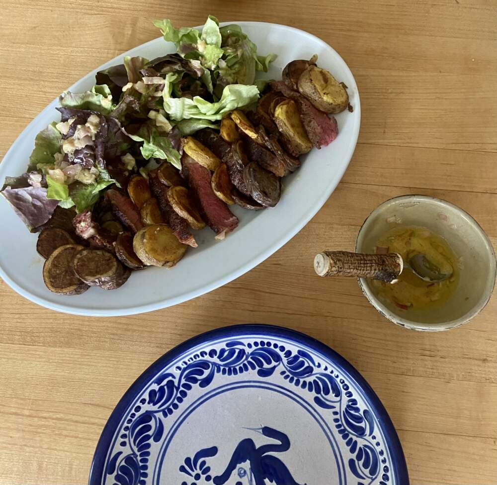 Steak and potato salad with shallot-mustard vinaigrette. (Kathy Gunst/Here & Now)