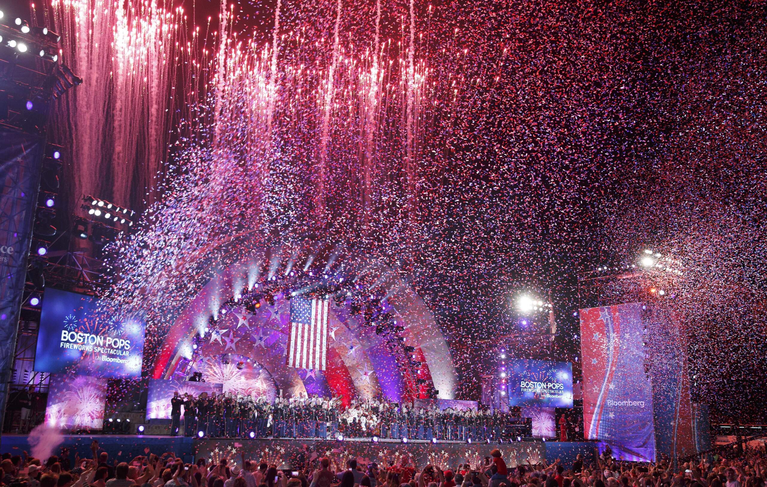 Fireworks shoot from the Hatch Shell as confetti falls during the annual Boston Pops Fireworks Spectacular on the Esplanade, Tuesday, July 4, 2017, in Boston. (Michael Dwyer/AP)