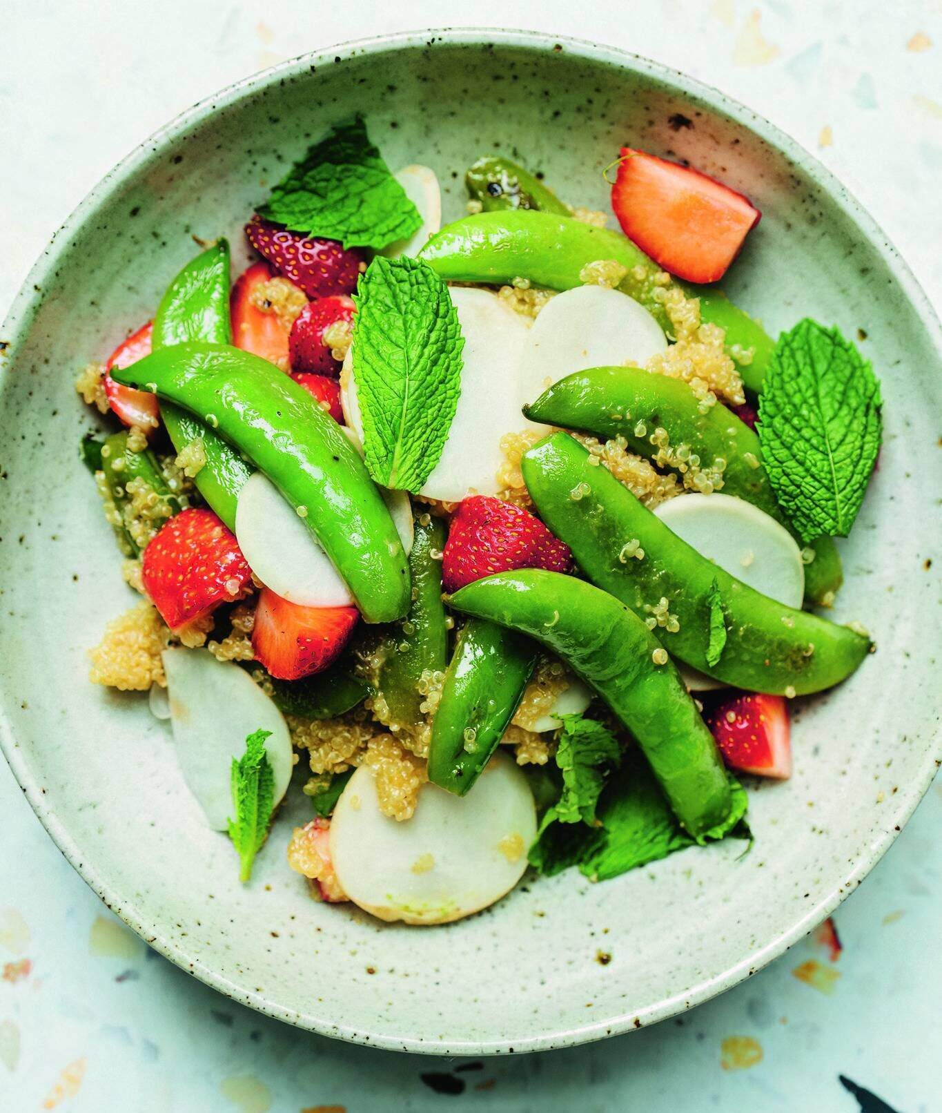 Miso-maple sugar snap pea, turnip and strawberry salad. (Hetty McKinnon)