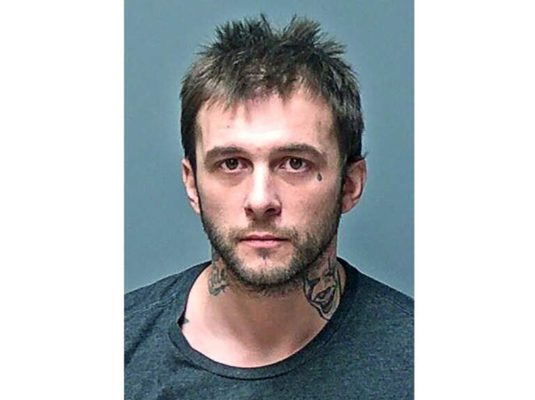 This booking photo shows Adam Montgomery, of Manchester, New Hampshire, who was charged with murder in connection with the disappearance of his 5-year-old daughter. Montgomery was convicted of unrelated gun charges on June 8, 2023. (Manchester Police Department via AP, File)
