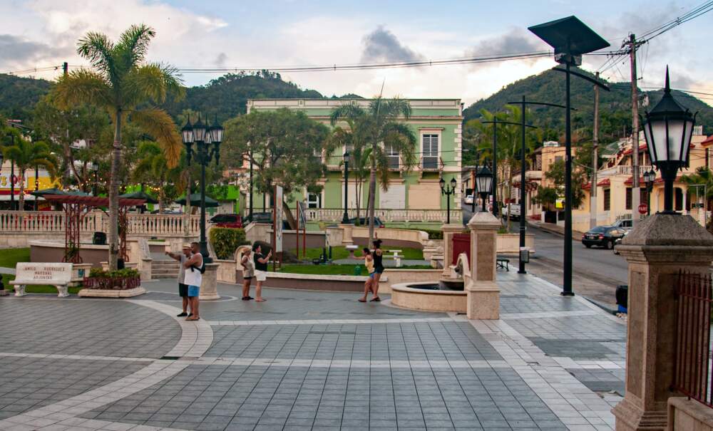 The main square in the mountain town of Adjuntas, Puerto Rico. Adjuntas was one of the last towns to get help after Hurricane Maria in 2017 and has since developed a solar microgrid system with the guidance of the Honnold Foundation and Casa Pueblo. (Chris Bentley/Here & Now)