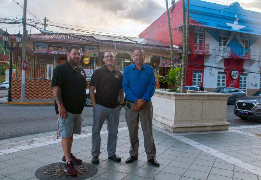 Jose Colón, Gustavo Irizarry, and Mario Mercado, three of the leaders of a newly formed nonprofit, ACESA, in the mountain town of Adjuntas, Puerto Rico. (Chris Bentley/Here & Now)