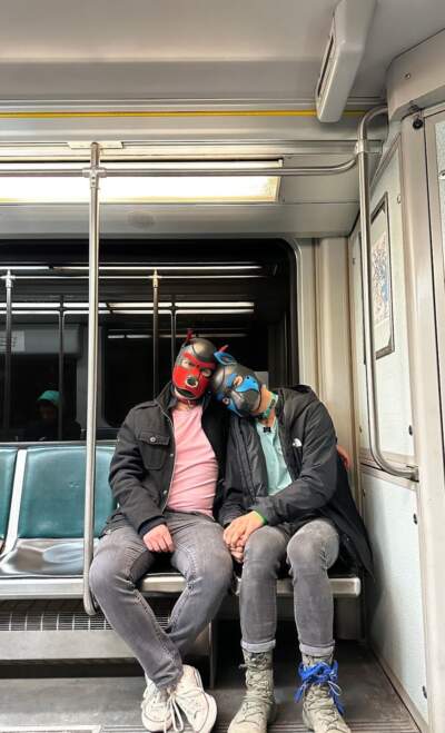 Two pups snuggling on public transportation. Credit: Nat Werth's Google Photos