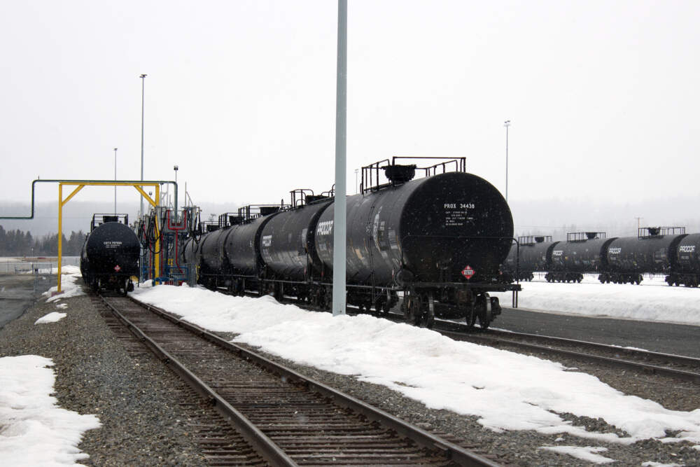 Rail cars carrying heating oil from Canada sit in the snow at a Dead River Company distribution terminal in Presque Isle, Maine, in late March 2023.