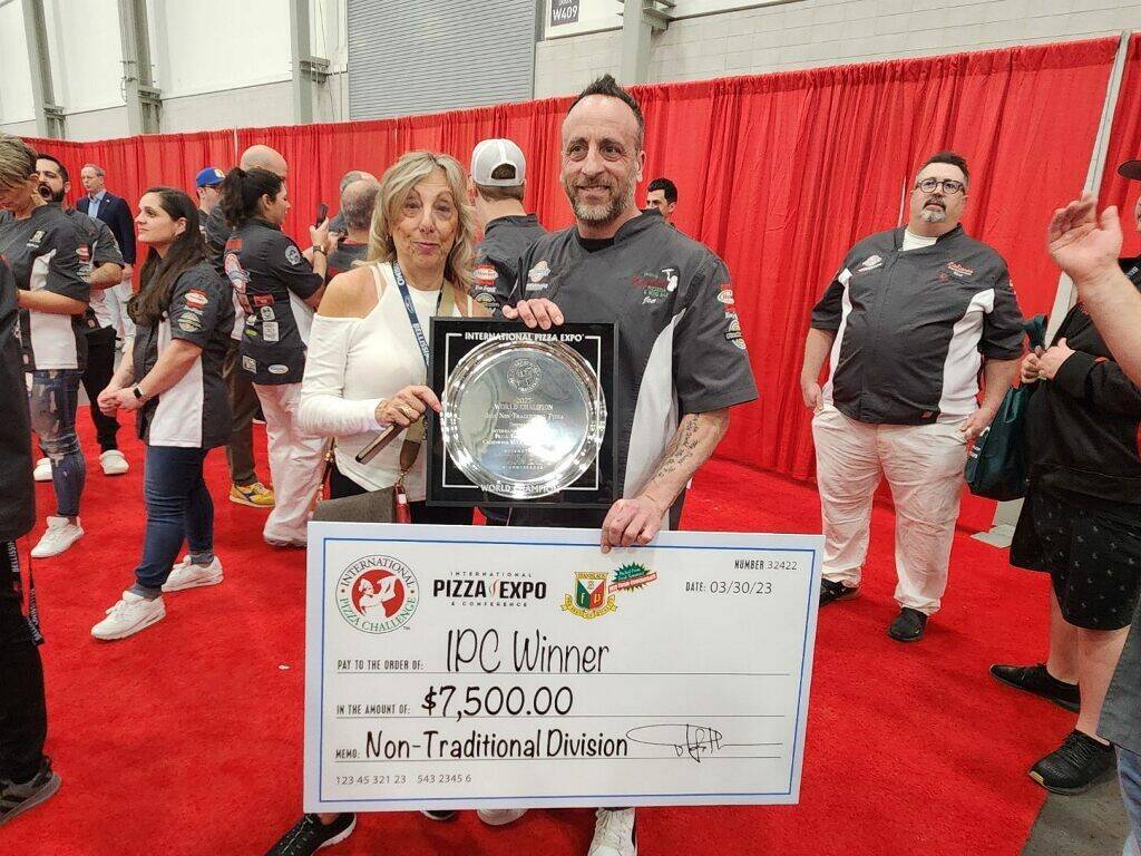 Joe Carlucci (right) won Best Pizza Maker of the Year and Best Non-Traditional Pizza awards at this year's International Pizza Expo in Las Vegas. (Camryn Suggs)