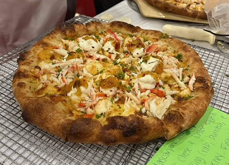 Joe Carlucci's pizza with lobster &amp; crabmeat, a mango chutney reduction, Italian parsley and red pepper flakes won Best Non-Traditional Pizza. (Camryn Suggs)