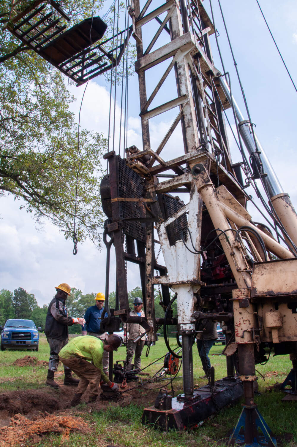 Workers cap an “orphaned” well in Greenwood, Louisiana that hasn’t produced any oil or gas in more than a decade. (Chris Bentley/Here & Now)