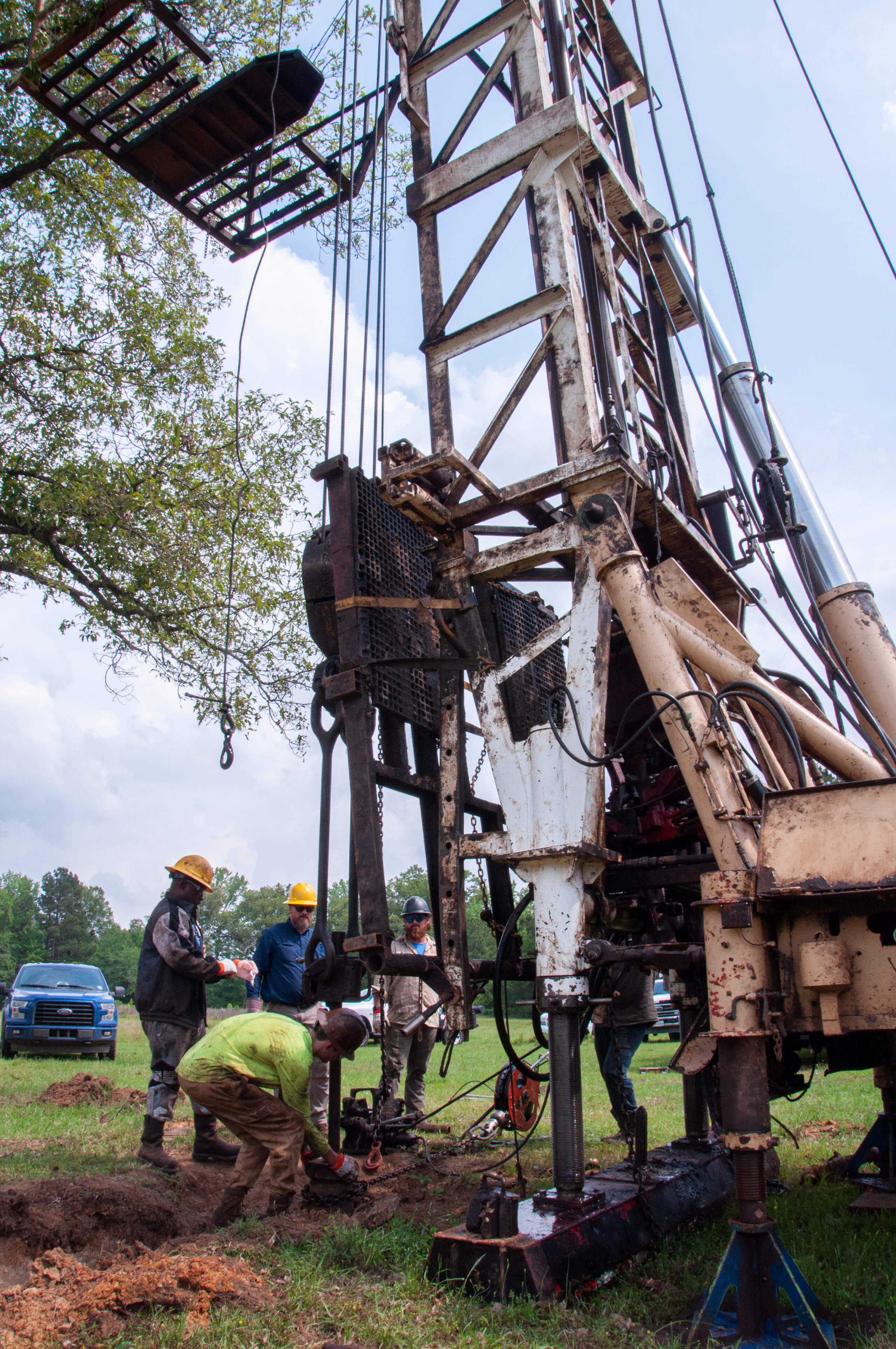 Workers cap an “orphaned” well in Greenwood, Louisiana that hasn’t produced any oil or gas in more than a decade. (Chris Bentley/Here & Now)