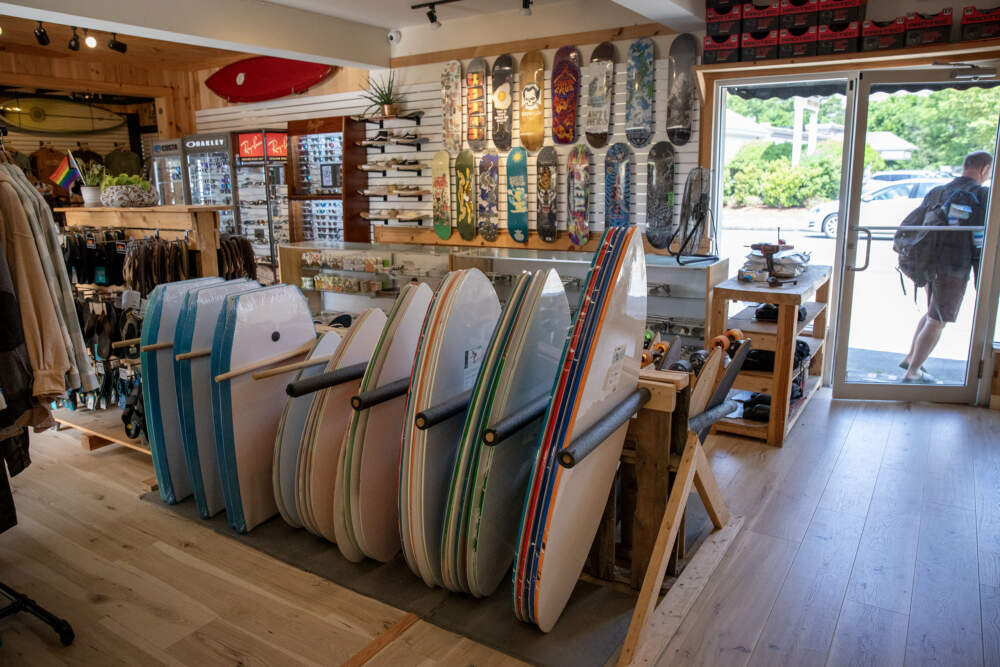 Skimboards and skateboards at the Levitate store in Marshfield. (Robin Lubbock/WBUR)