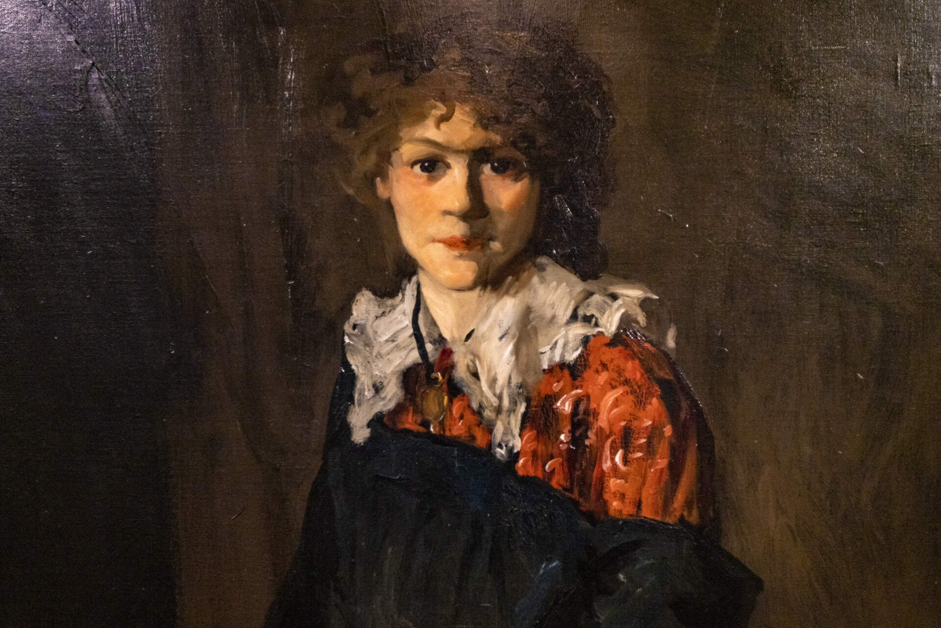 Detail of Robert Henri's “The Art Student (Miss Josephine Nivison),” 1906. The work is on view in Cape Ann Museum's “Edward Hopper &amp; Cape Ann: Illuminating an American Landscape.” (Jesse Costa/WBUR)