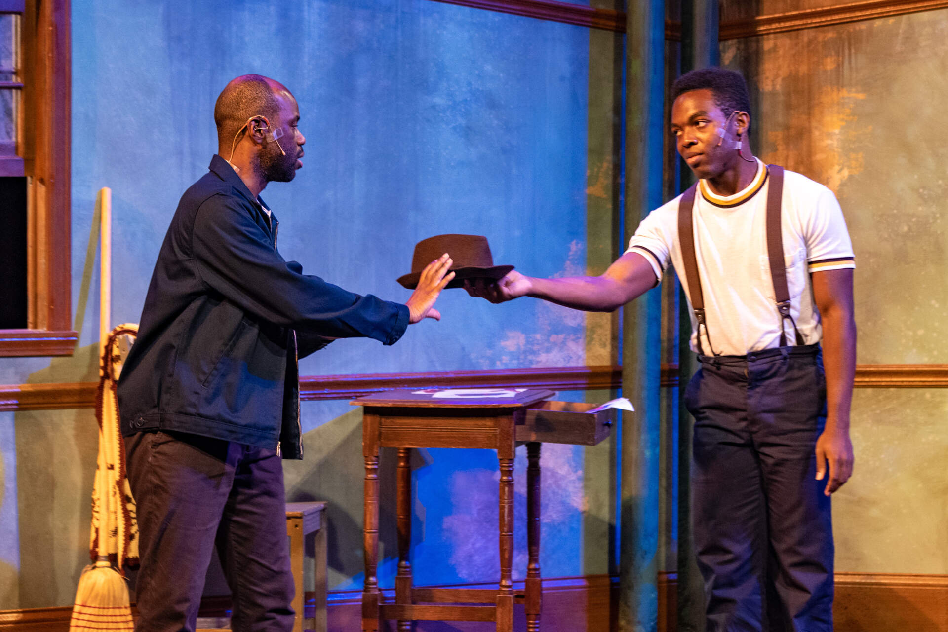 Cedric Lilly, as Mel, and Errol Service Jr., as The Boy, perform during a dress rehearsal of “The Boy Who Kissed the Sky” at the Strand Theatre. (Jesse Costa/WBUR)