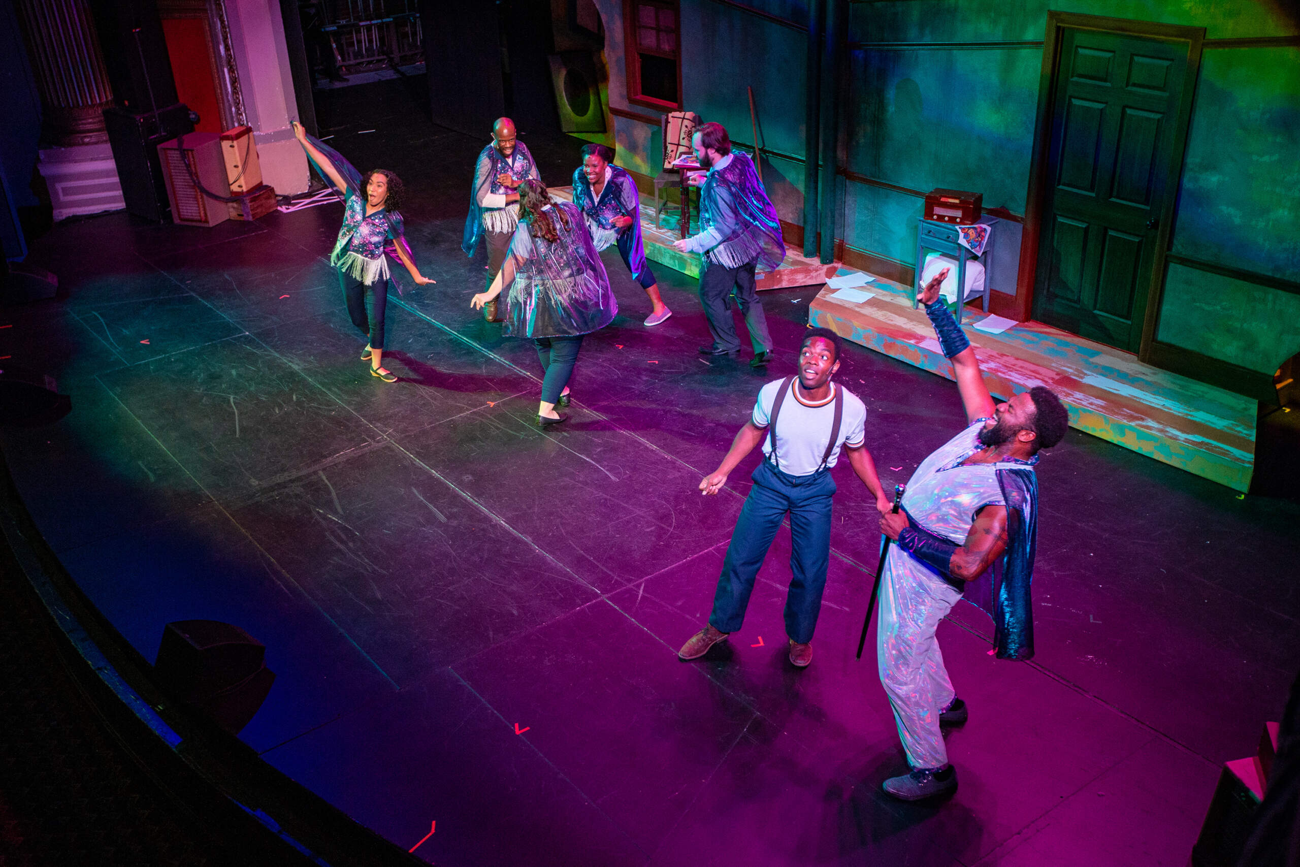 Errol Service Jr., as The Boy, and Martinez Napoleon, as J. Sonic, with the cast of "The Boy Who Kissed the Sky" during a dress rehearsal at the Strand Theatre. (Jesse Costa/WBUR)