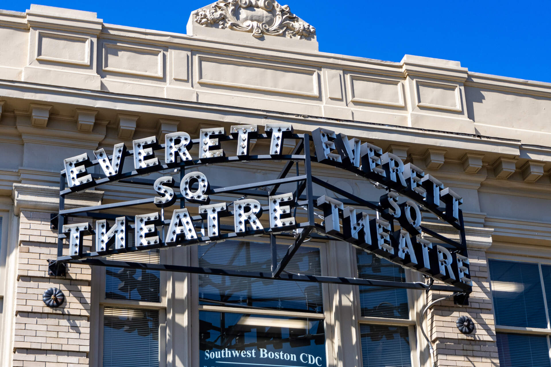 The historic Everett Square Theater sign in in Cleary Square in Hyde Park. (Jesse Costa/WBUR)