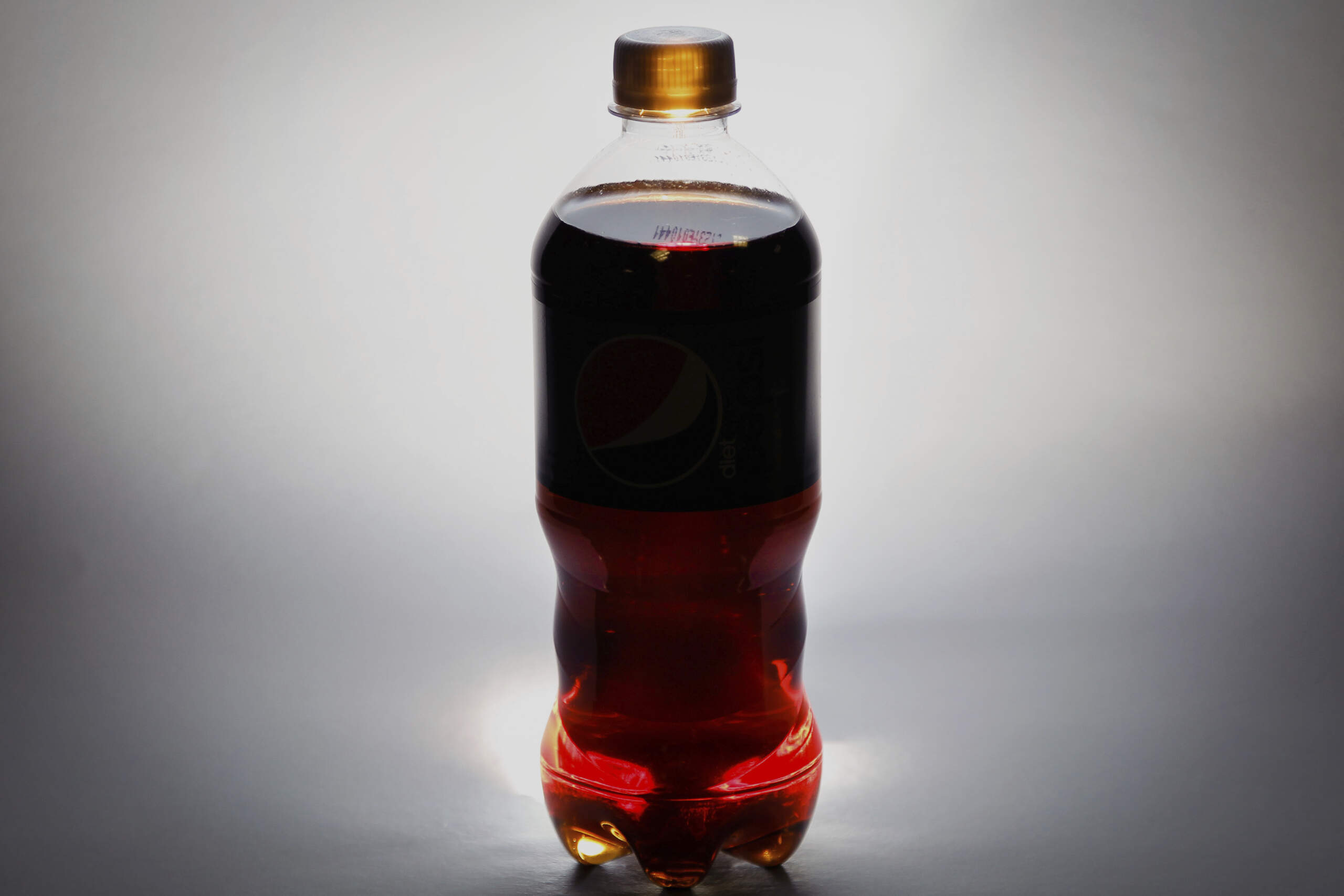 A bottle of soda is photographed. The International Agency for Research on Cancer, the cancer research arm of the World Health Organization, deemed aspartame, the world’s most widely used artificial sweetener, to be “possibly carcinogenic” to humans. (J. David Ake/AP)
