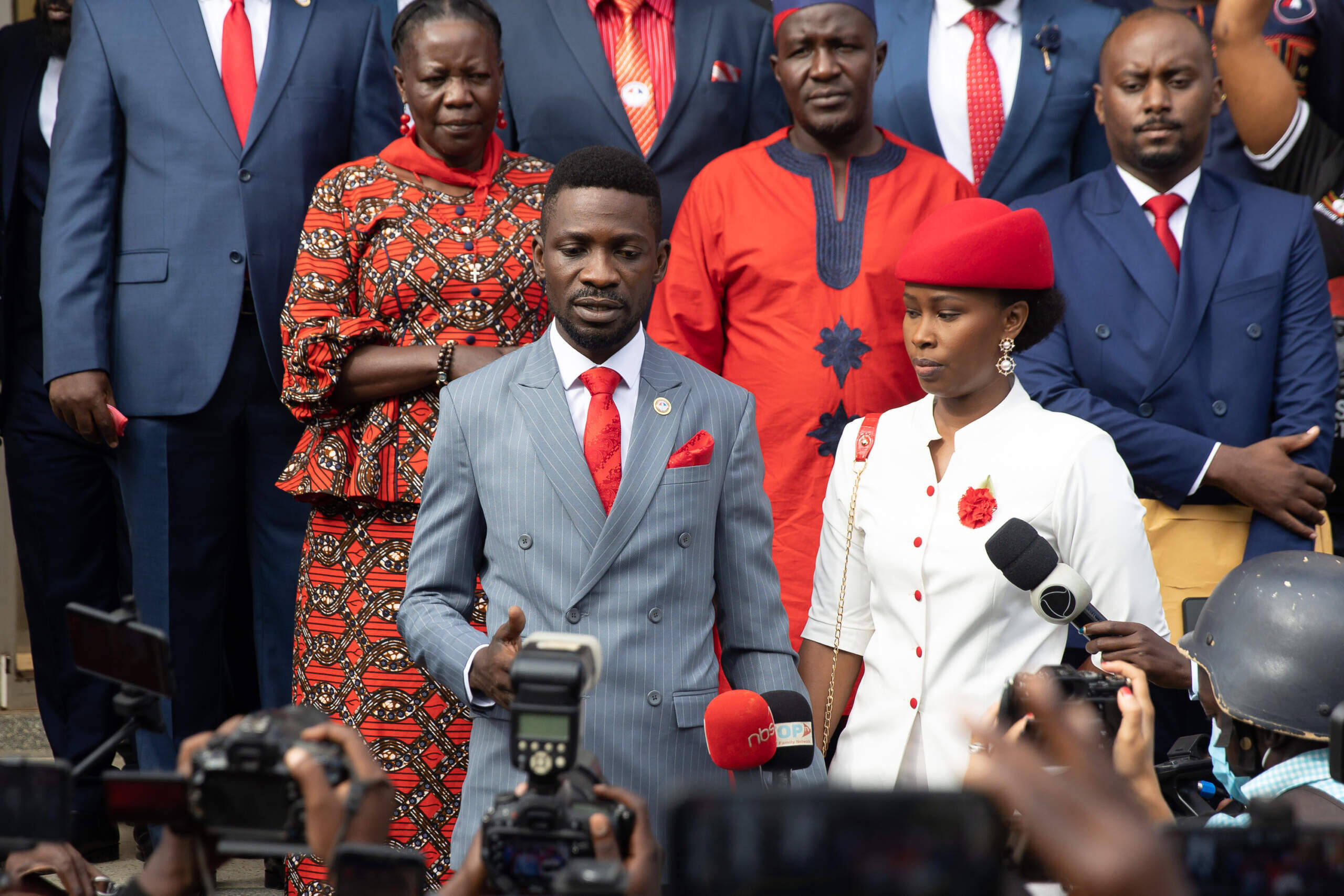 Bobi Wine and his wife, Barbie Itungo Kyagulany, address the media before leaving their house for the Presidential Nominations on November 03, 2020 in Kampala, Uganda. Popular singer Robert Kyagulanyi Ssentamu, better known by his stage name of H.E. Bobi Wine, is set to appear before the Independent Electoral Commission this morning to be nominated to stand against incumbent Yoweri Museveni in the up coming Presidential elections in Uganda. (Photo by Luke Dray/Getty Images)
