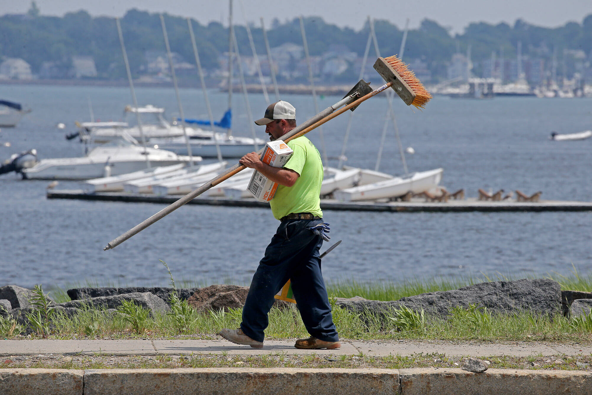 A construction worker on Morrissey Boulevard on a hot summer day in Boston. (Stuart Cahill/MediaNews Group/Boston Herald)