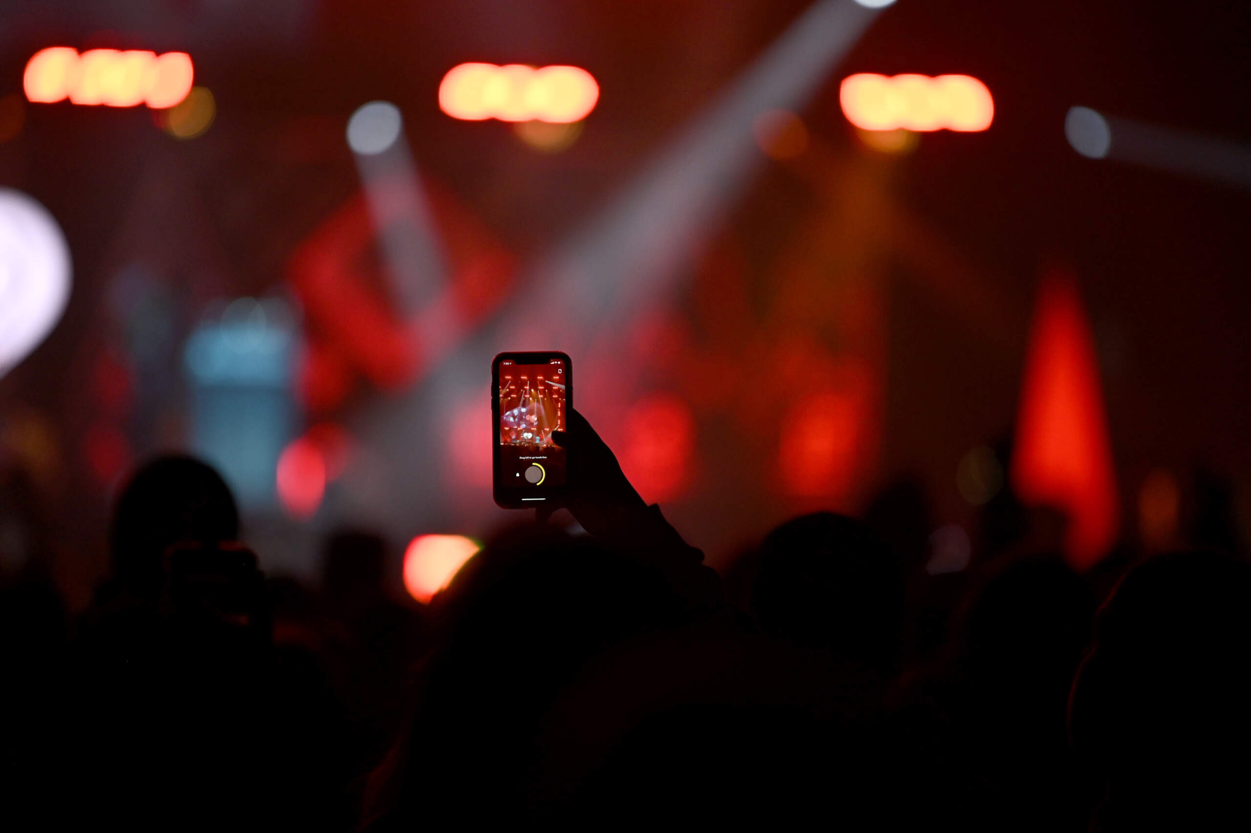 Why are fans throwing objects — and cremains — at performers? Unpacking bad concert behavior