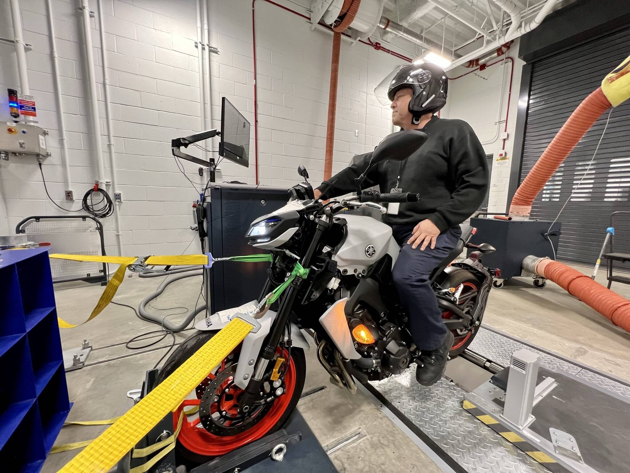 Emissions testing of a motorcycle in the California Air Resources Board's new lab in the city of Riverside. (Photo: Saul Gonzalez/KQED)