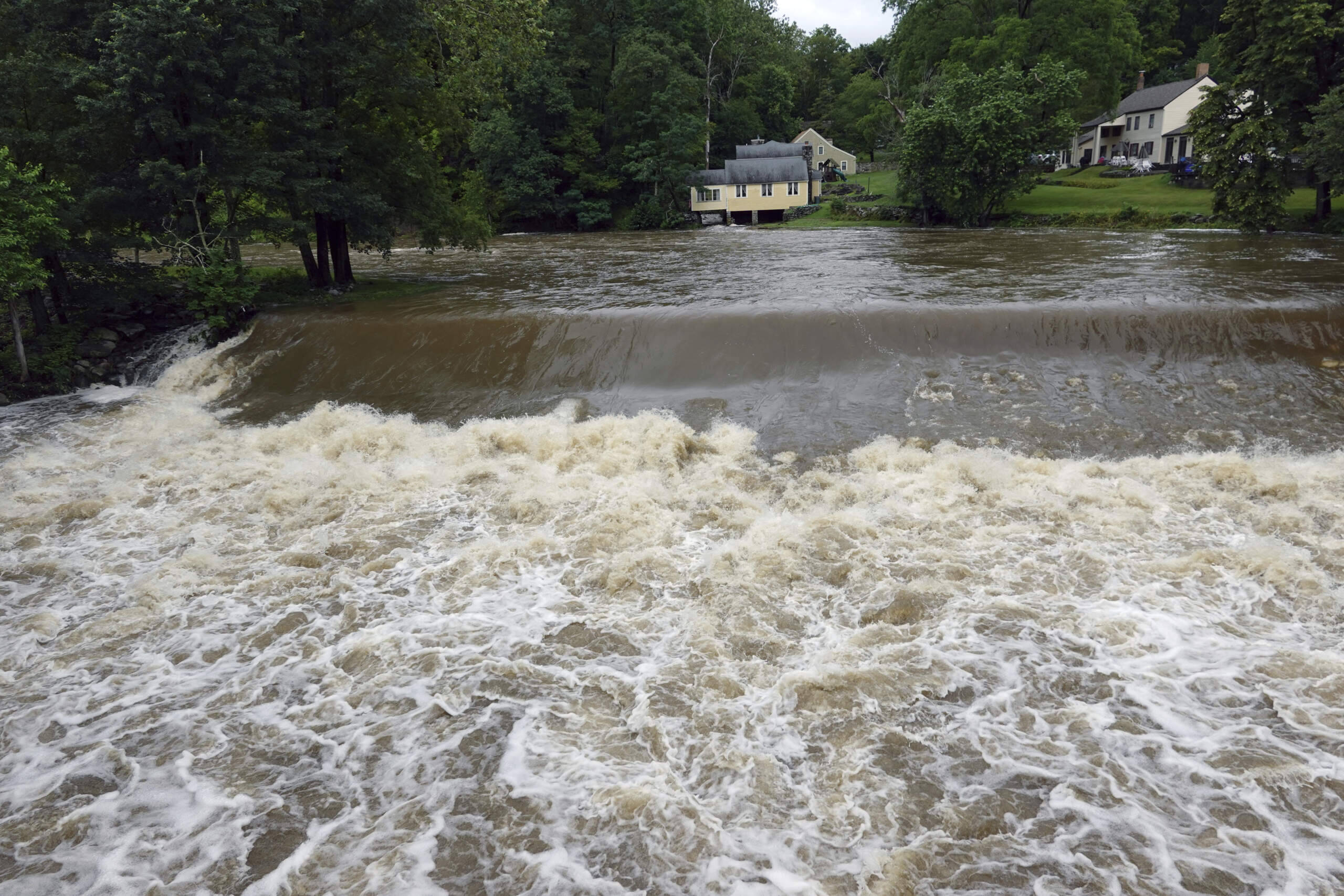The Moodna Creek flows through Cornwall, a town in New York's Hudson Valley, during the storm, July 10, 2023. (Paul Kazdan/AP)