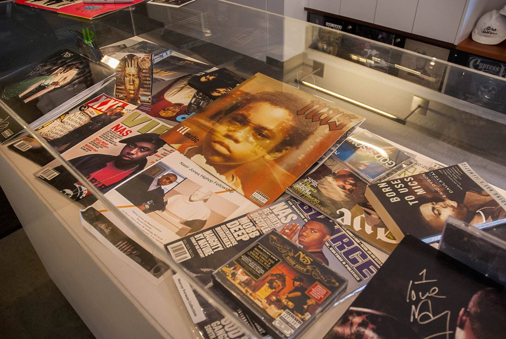 A display case of rap artist Nasir Jones, featuring an issue of The Source magazine, bottom right. (Tonya Mosley/WBUR)