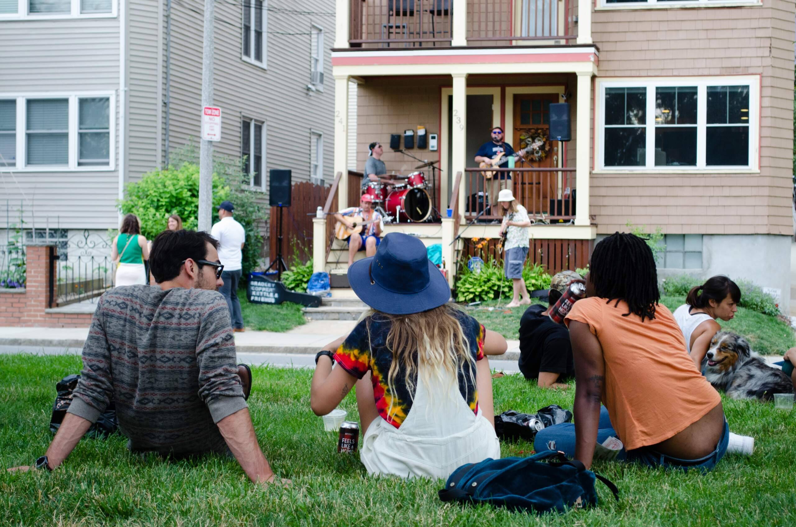 Spectators at the Jamaica Plain Porchfest. (Elizabeth Gillis/WBUR)