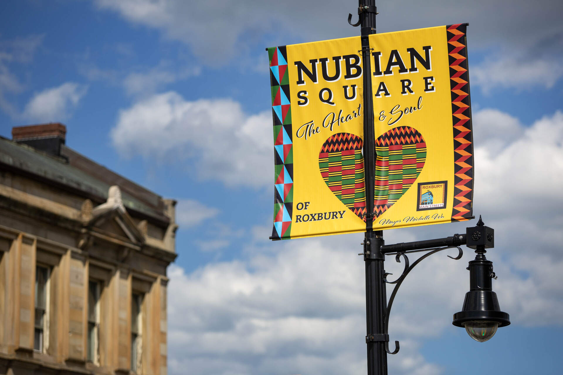 A sign for Nubian Square, the main business district, dubbed &quot;the Heart &amp; Soul of Roxbury&quot; in Boston. (Robin Lubbock/WBUR)